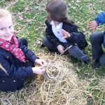 Using straw and string.